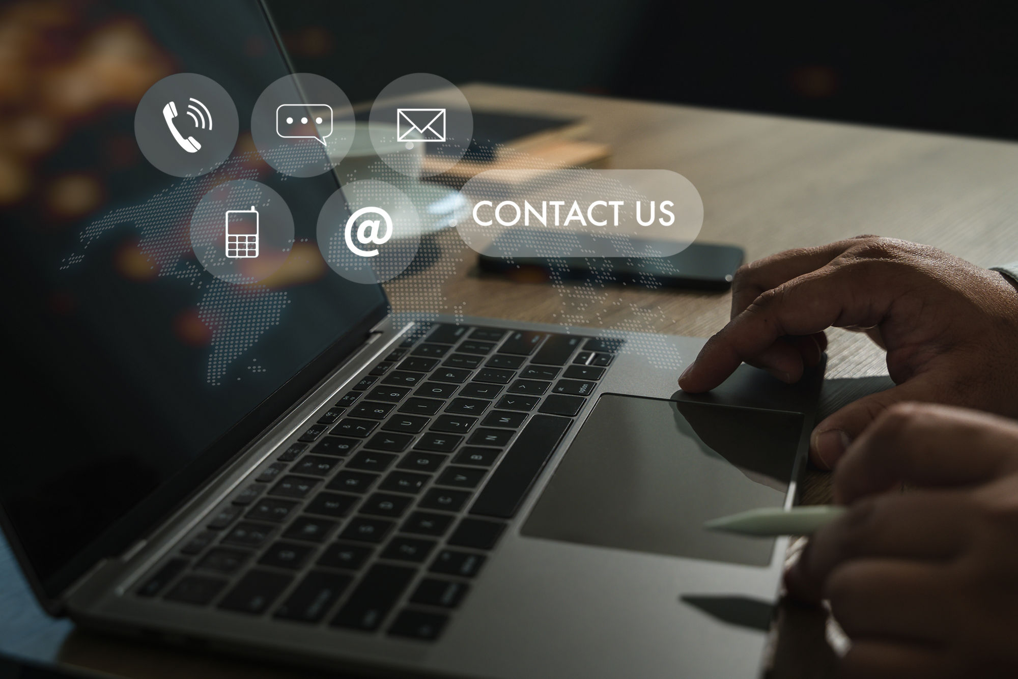 Contact us concept, hand using laptop with communication icons, digital marketing

