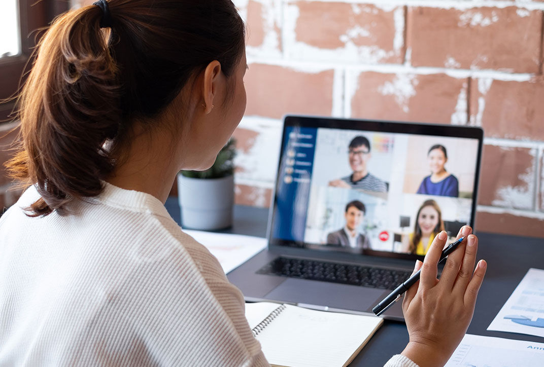 A virtual meeting with five people.