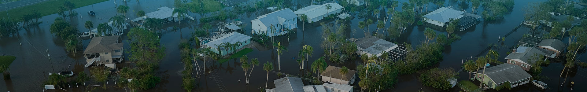 Aerial view of homes and streets flooded following a natural disaster | Kuraray Foundation of America, Inc. 