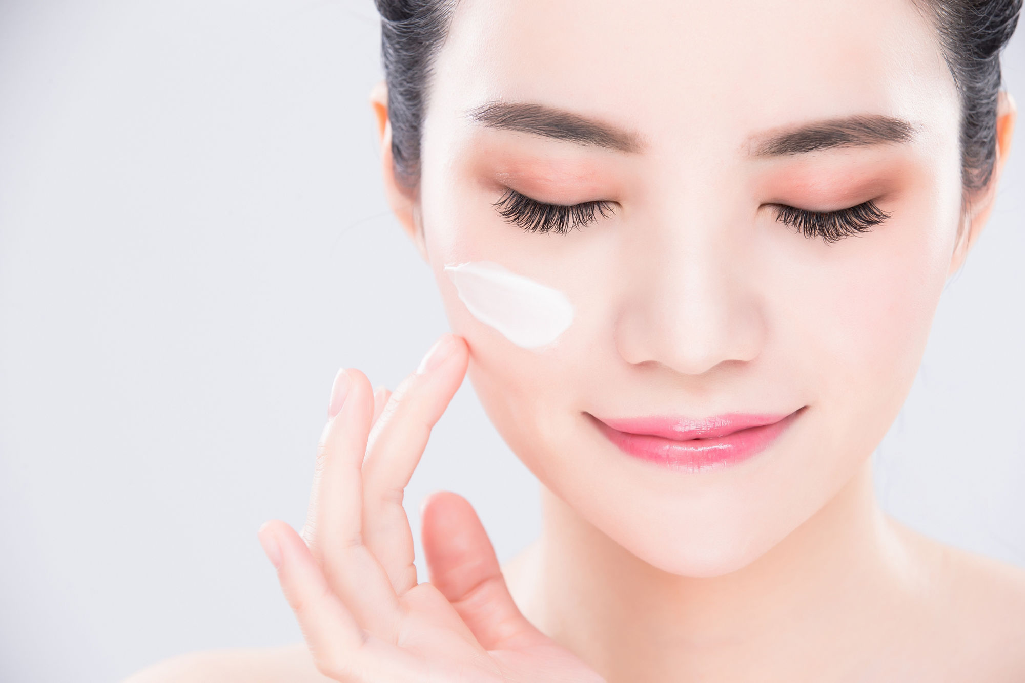 woman close eyes and touch face with beauty skin care concept