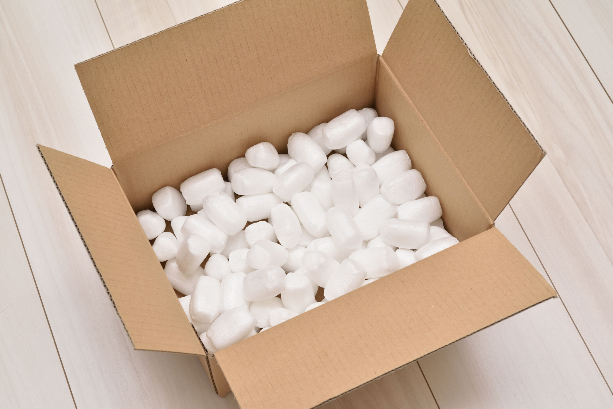 Cushioning material for protective packaging